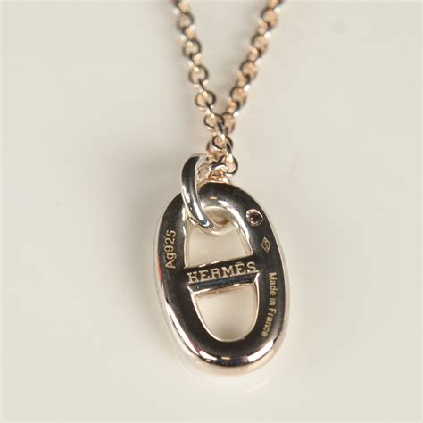 Hermes silver pendant necklace